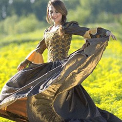 Princess in gold dress in field